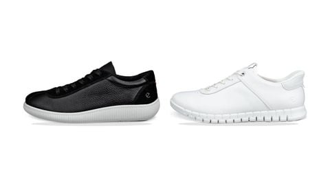 Sneaker đen và trắng kiểu dáng gọn cho trang phục văn phòng