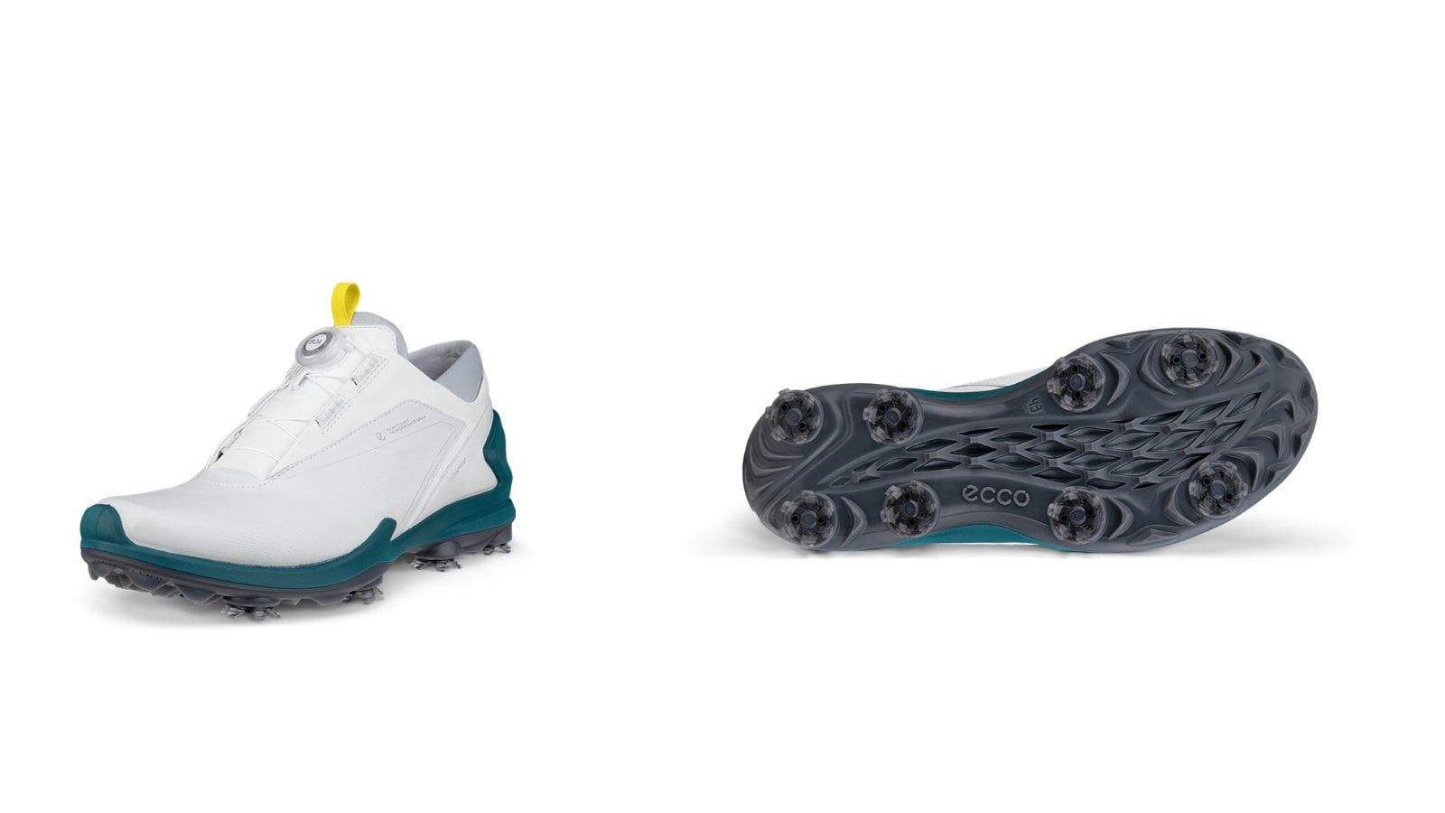 Giày golf trắng xanh và mặt đế với các cleat mềm