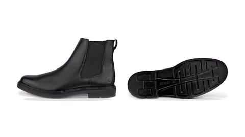 Chelsea boot đen và mặt đế ngoài để kiểm tra cấu tạo