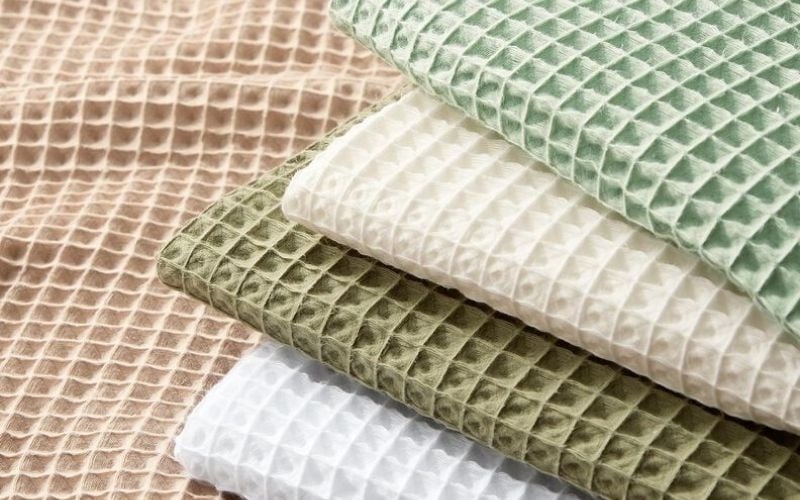 Vải waffle là gì? Ưu nhược điểm, phân loại và bảng giá