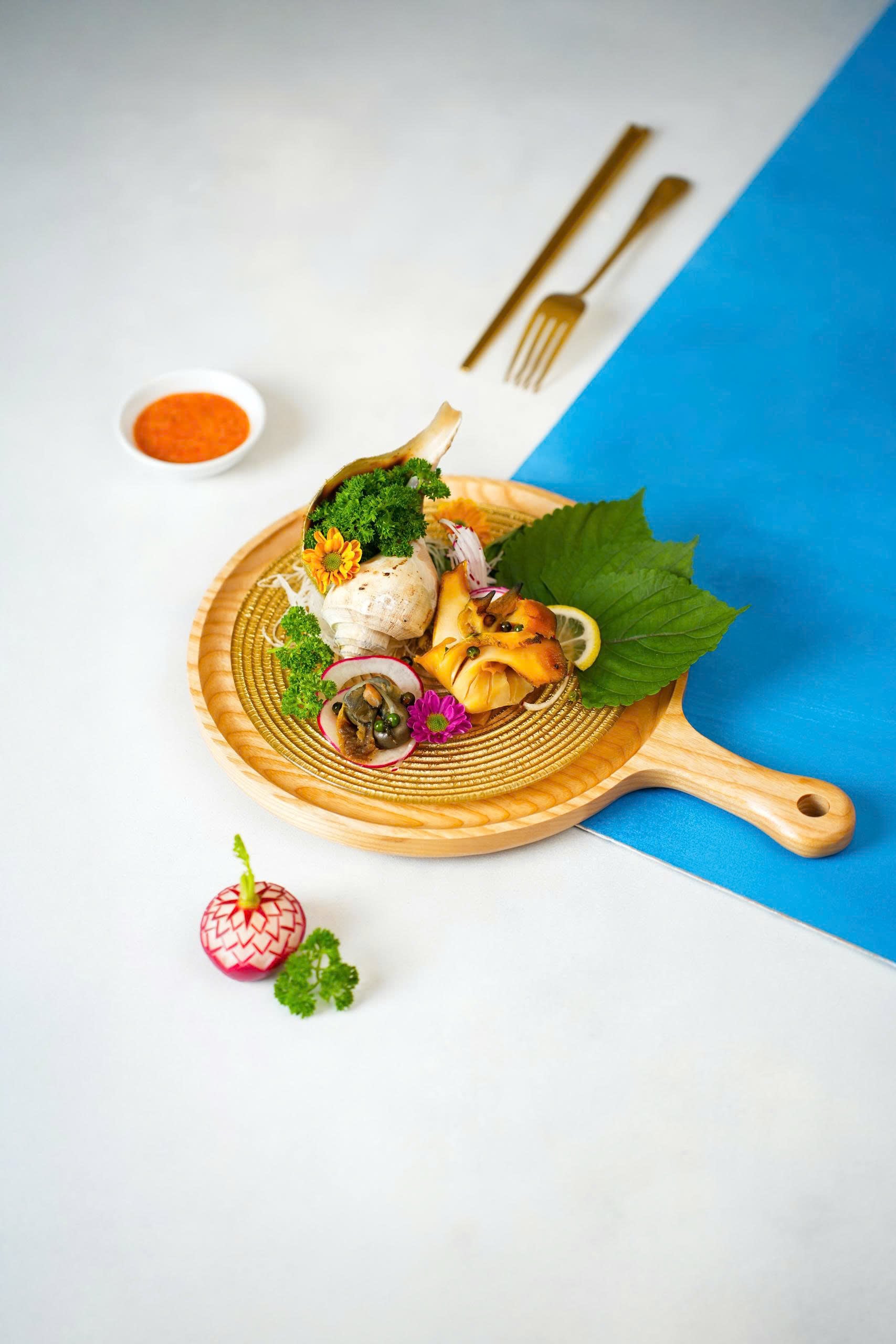 Ốc k&egrave;n Bắc Mỹ nướng mắm ti&ecirc;u