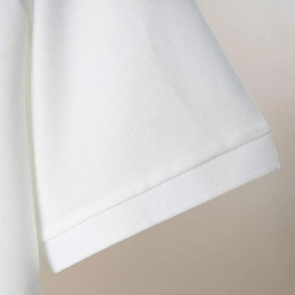 Chi tiết áo polo trắng trơn big size nam Akyoo