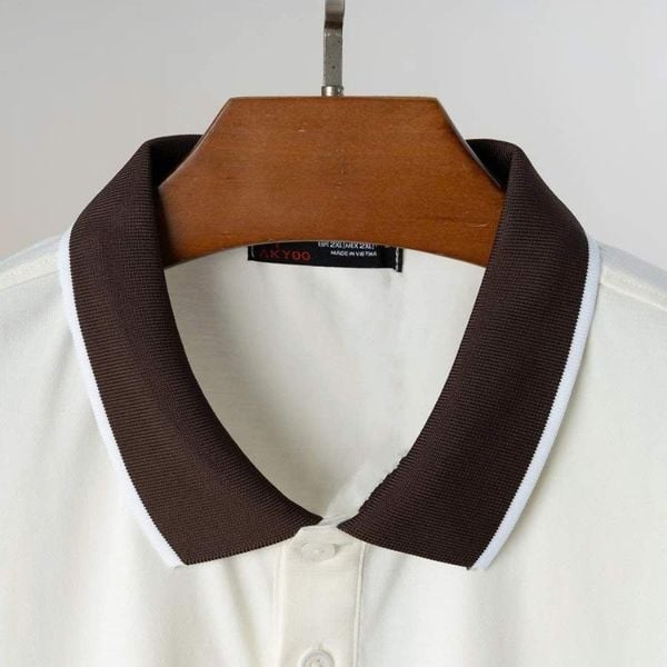 Chi tiết áo polo trắng cổ nâu big size nam AKYOO
