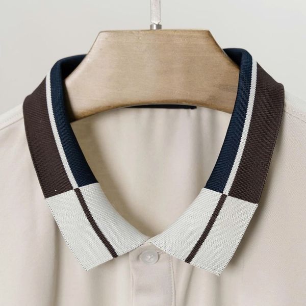 Chi tiết áo polo kem big size nam AKYOO