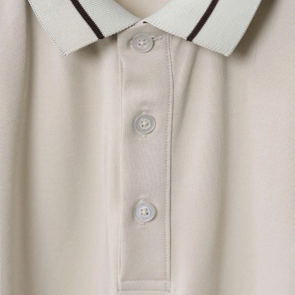 Chi tiết áo polo kem big size nam AKYOO