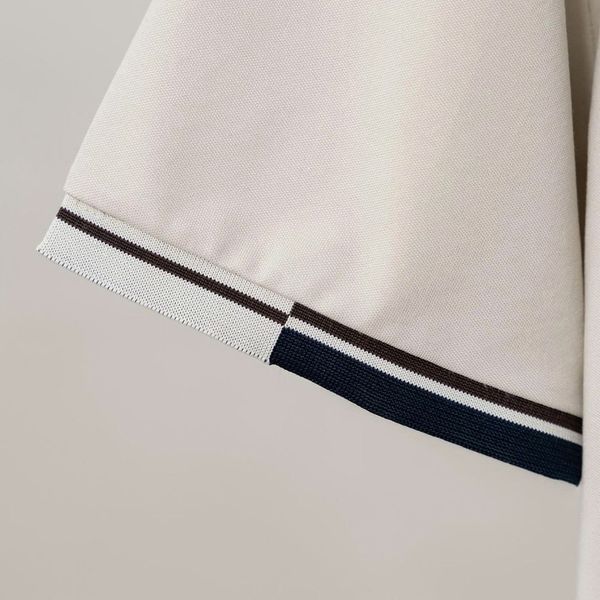 Chi tiết áo polo kem big size nam AKYOO