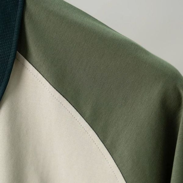 Chi tiết áo polo phối be big size nam AKYOO