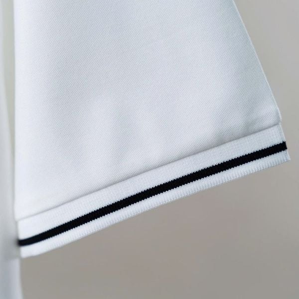 Chi tiết áo polo trắng cổ viền big size nam AKYOO