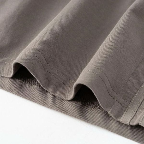 Chi tiết chất thun và đường may gấu quần short nâu nam big size