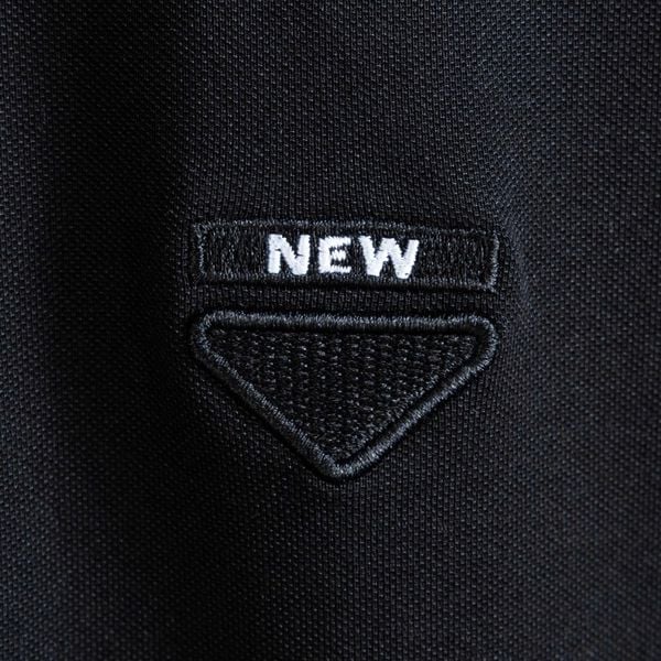 Chi tiết áo polo đen viền big size nam Akyoo