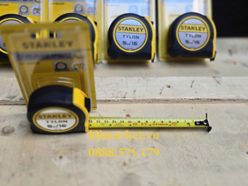 Chi tiết vạch chia hệ mét và hệ inch trên lá thước cuộn Stanley 5m STHT37191