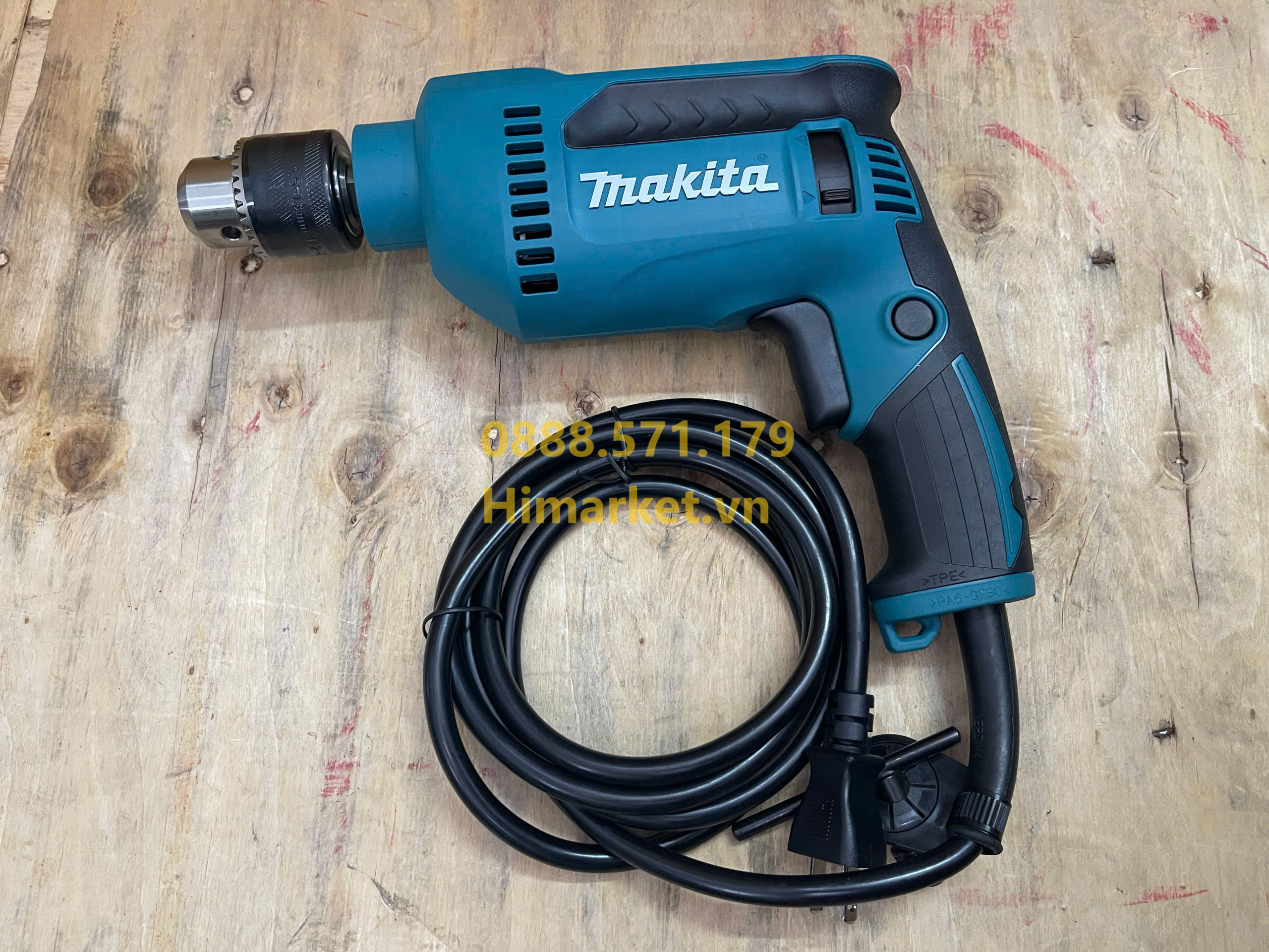 Máy khoan cầm tay Makita DP4020 công suất 630W