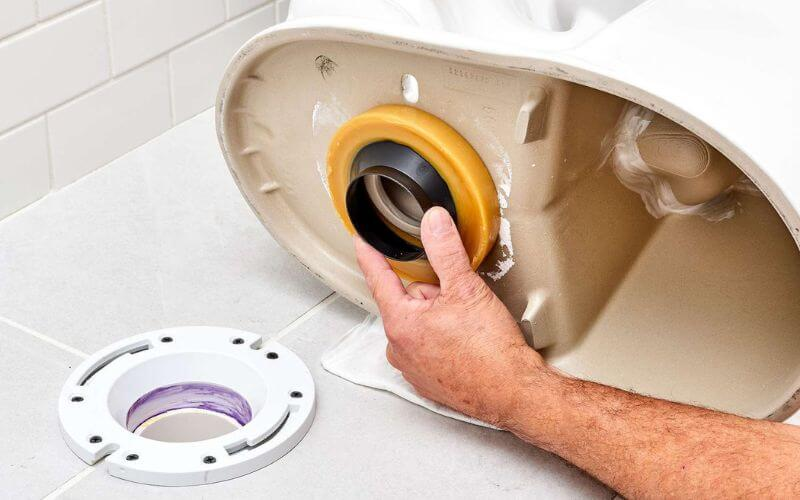 Lắp sai tâm xả khiến nước không thoát đúng hướng và gây trào ngược
