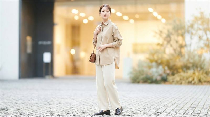 Áo sơ mi bất đối xứng tối giản thể hiện phong cách cá tính, hiện đại và gu thời trang độc đáo.