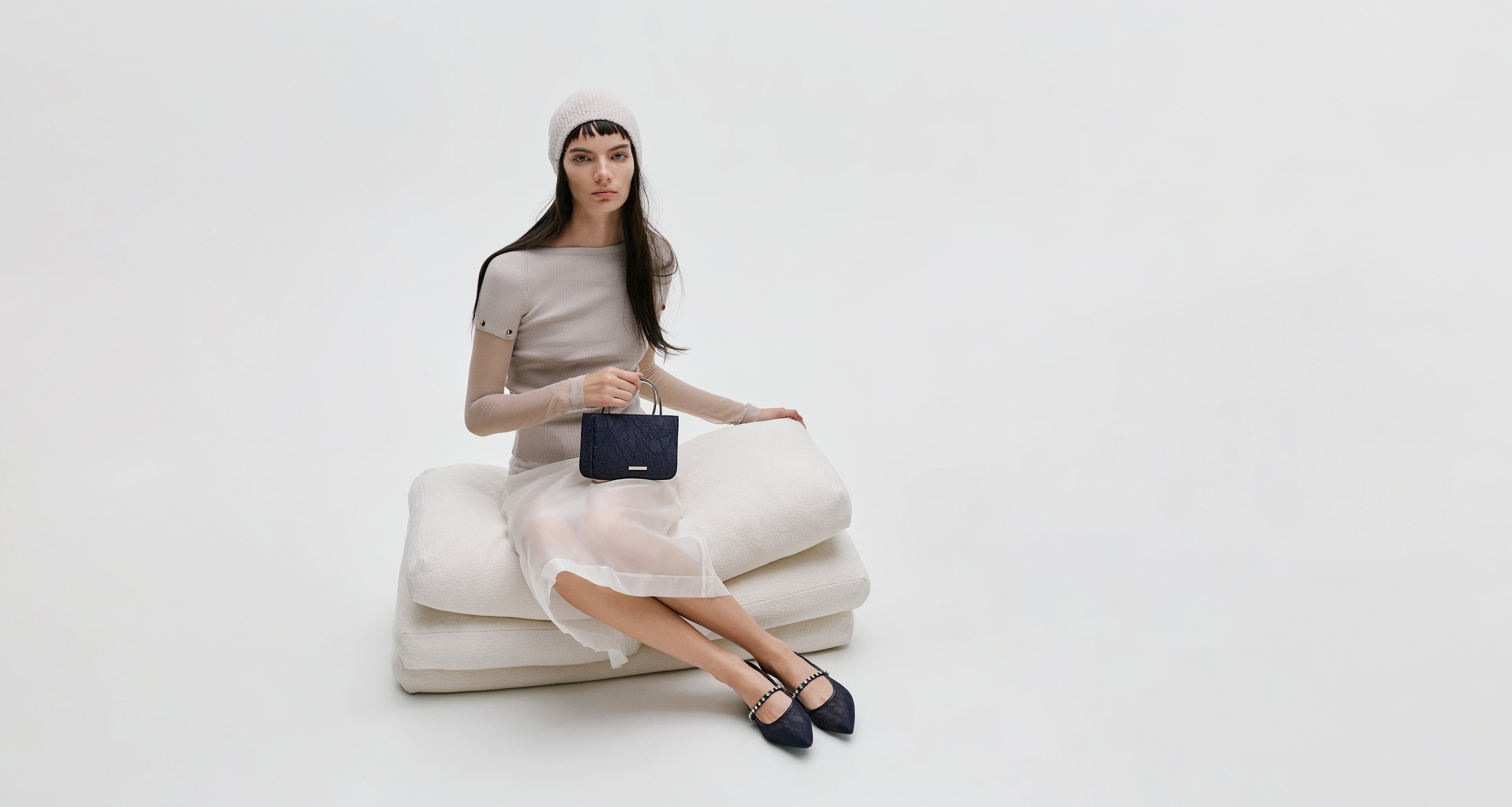 Bubblegum pink Sammie Knotted-Handle Elongated Bag; Sea Salt Blue Sammie Knotted-Handle Front-Flap Bag and Butter Yellow Crochet Flower Beaded Charm - CHARLES & KEITH