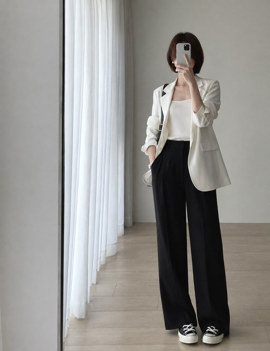 Áo vest nữ phối quần ống rộng hiện đại, thanh lịch