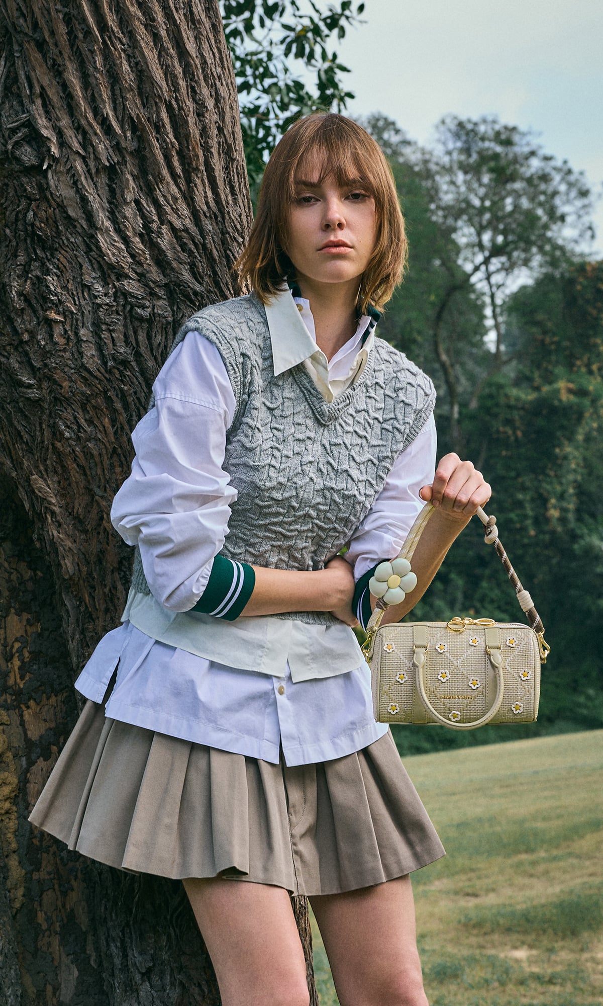 Bubblegum pink Sammie Knotted-Handle Elongated Bag; Sea Salt Blue Sammie Knotted-Handle Front-Flap Bag and Butter Yellow Crochet Flower Beaded Charm - CHARLES & KEITH