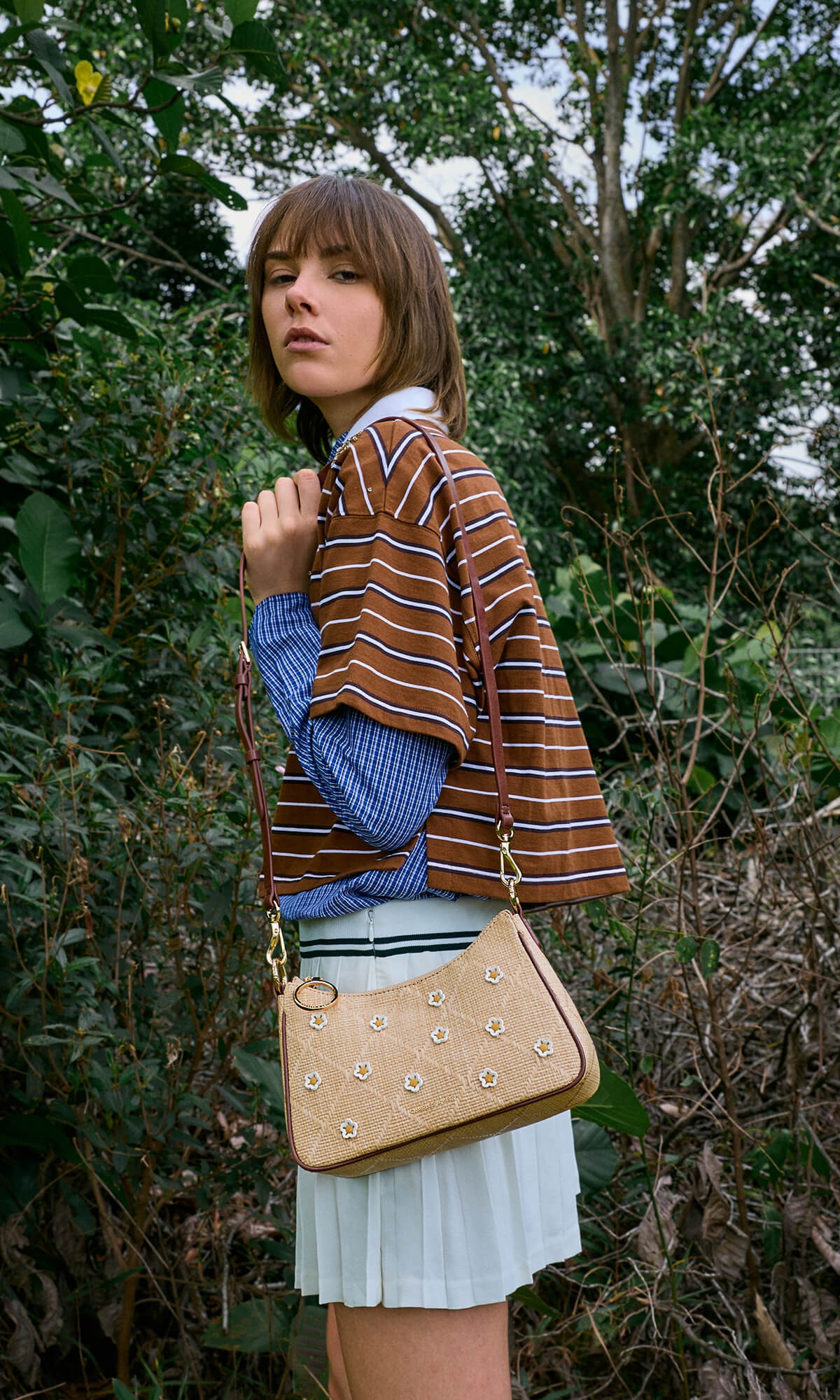 Bubblegum pink Sammie Knotted-Handle Elongated Bag; Sea Salt Blue Sammie Knotted-Handle Front-Flap Bag and Butter Yellow Crochet Flower Beaded Charm - CHARLES & KEITH