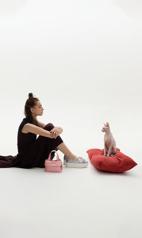 Bubblegum pink Sammie Knotted-Handle Elongated Bag; Sea Salt Blue Sammie Knotted-Handle Front-Flap Bag and Butter Yellow Crochet Flower Beaded Charm - CHARLES & KEITH