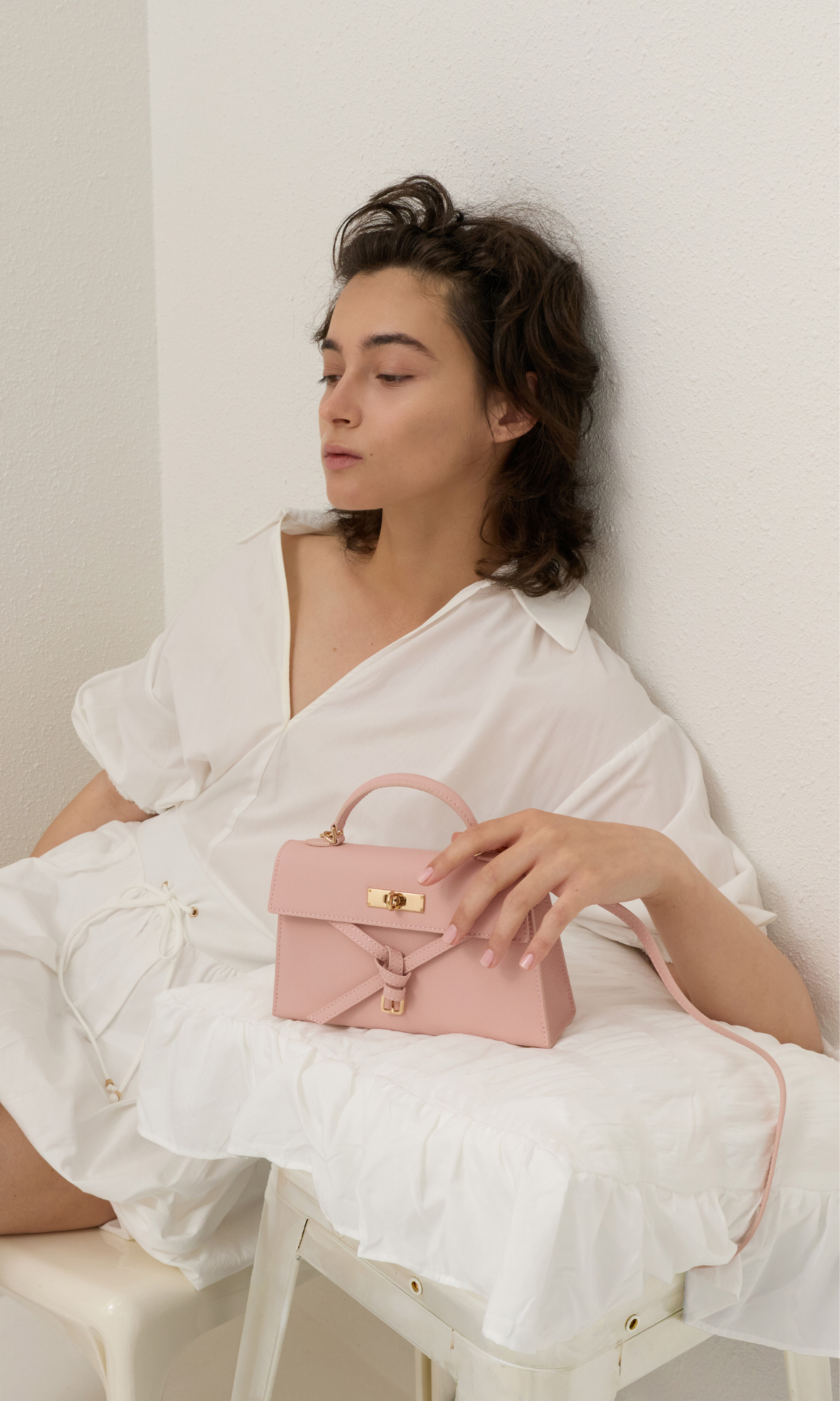 Bubblegum pink Sammie Knotted-Handle Elongated Bag; Sea Salt Blue Sammie Knotted-Handle Front-Flap Bag and Butter Yellow Crochet Flower Beaded Charm - CHARLES & KEITH