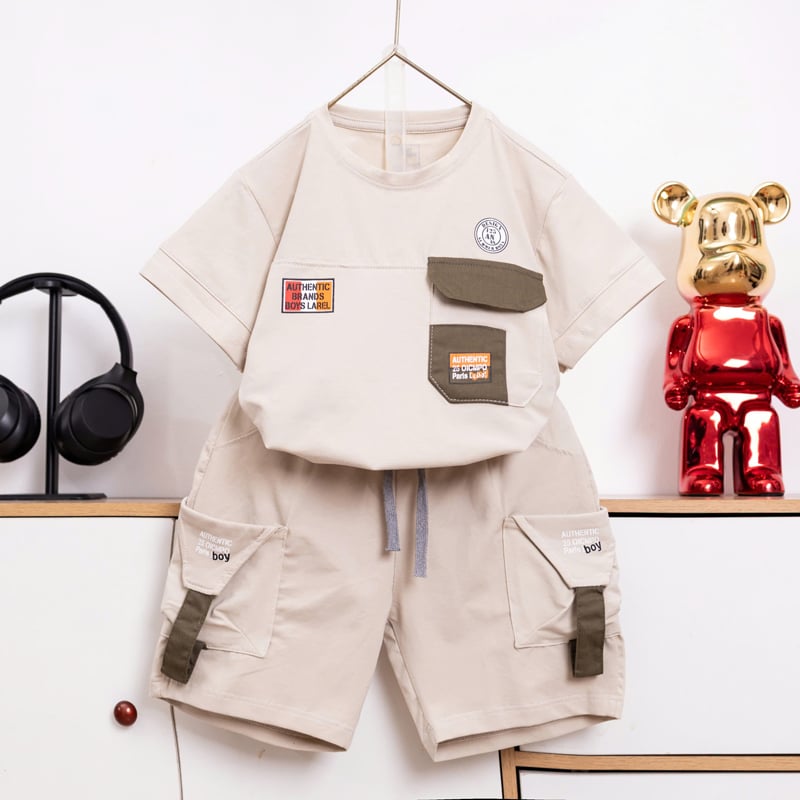 ​​​​​​​Bộ thun bé trai nắp túi logo tag