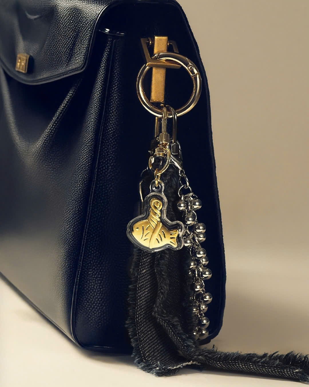 charm-tui-xach-vang-24k