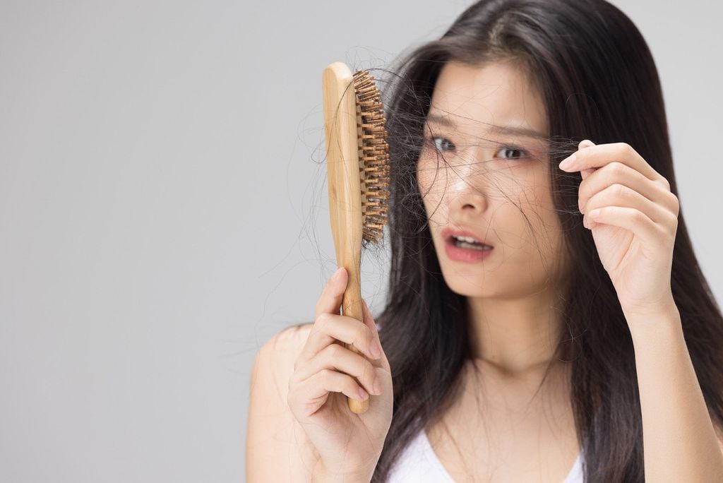 Dầu gội tinh chất gừng phục hồi tóc yếu, rụng tóc