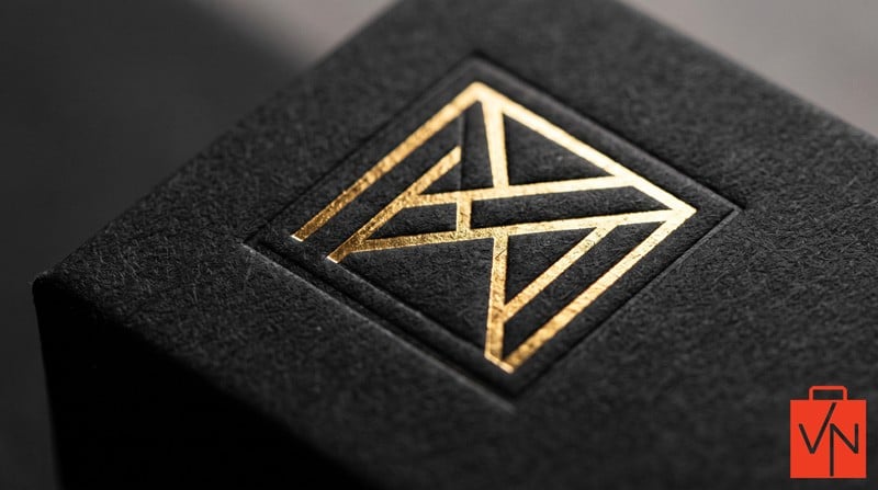 Gold foil stamping and embossing finish on luxury packaging