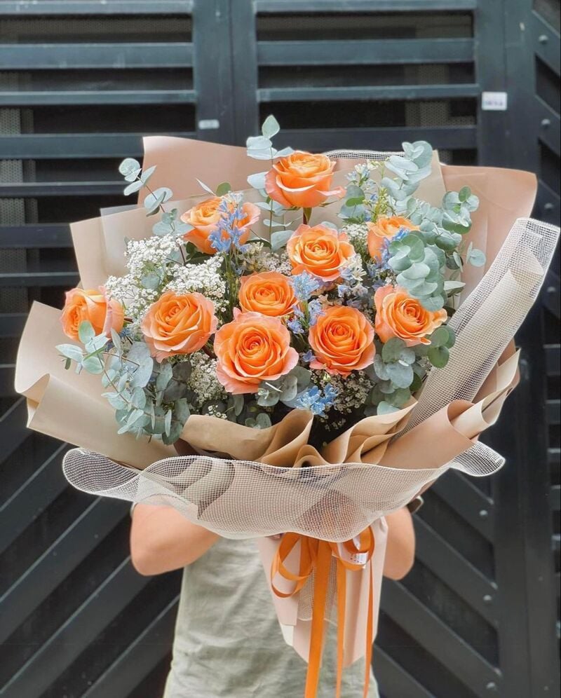 Hoa hồng cam là lựa chọn lý tưởng để tặng đồng nghiệp, sếp trong ngày 8/3