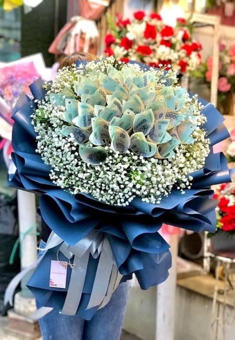 Bó hoa tiền 500k 20 tờ là món quà giá trị để tặng bố mẹ, người thương