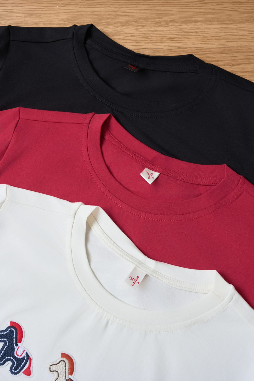 Áo cotton cổ tròn tay cộc dáng suông