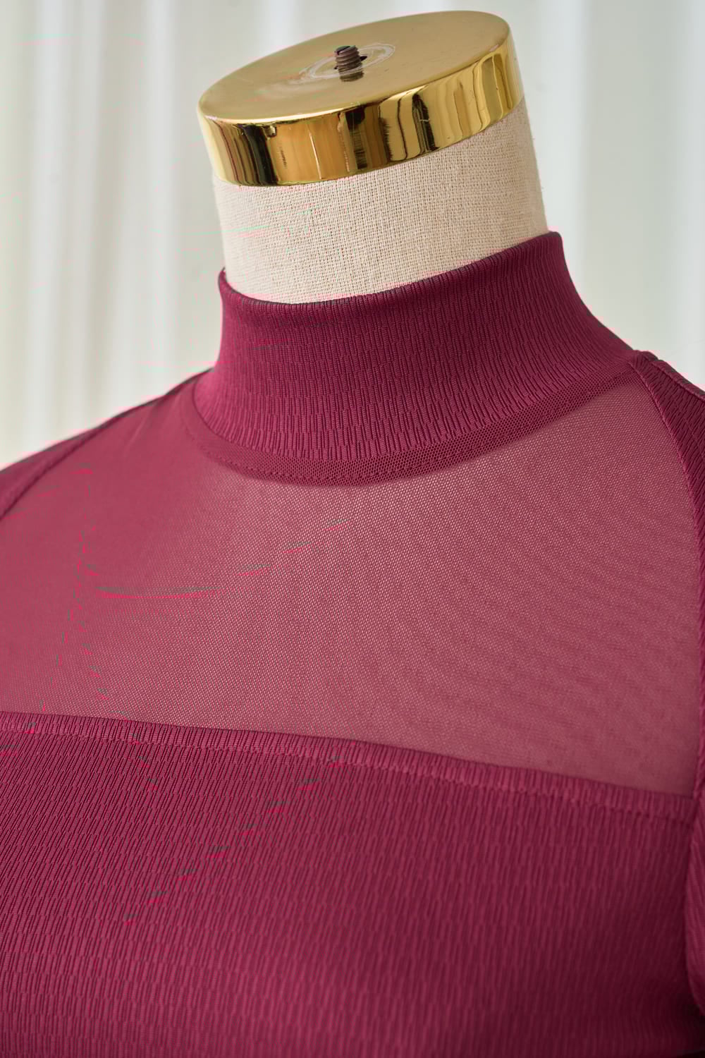 Áo len nữ vải len gân dài tay cao cổ phối lưới ngực