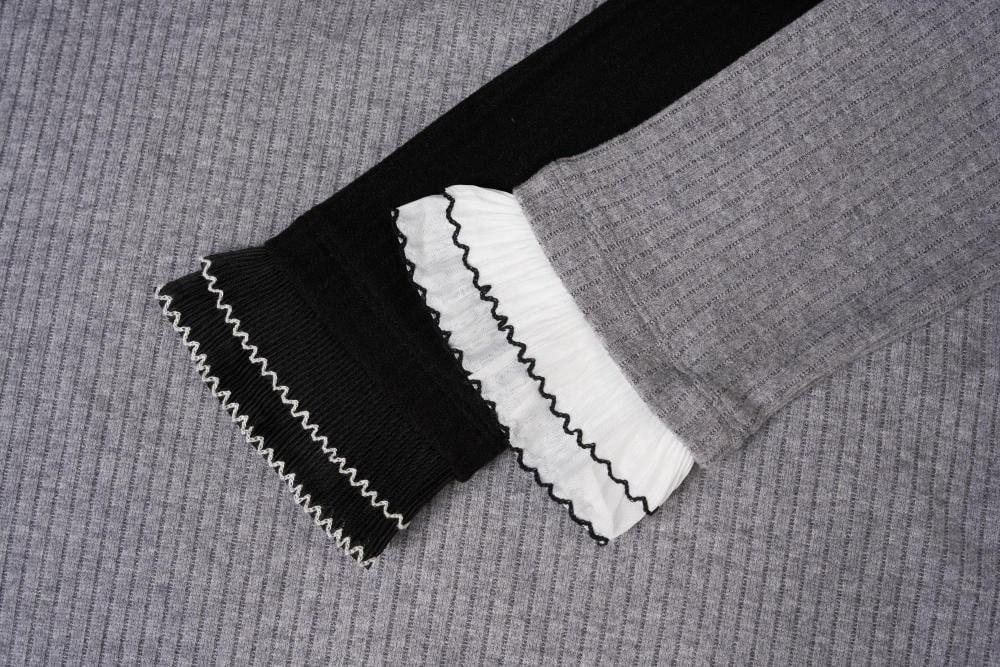 Áo nỉ nữ lông cừu sọc to dáng suông phối bèo cổ tay