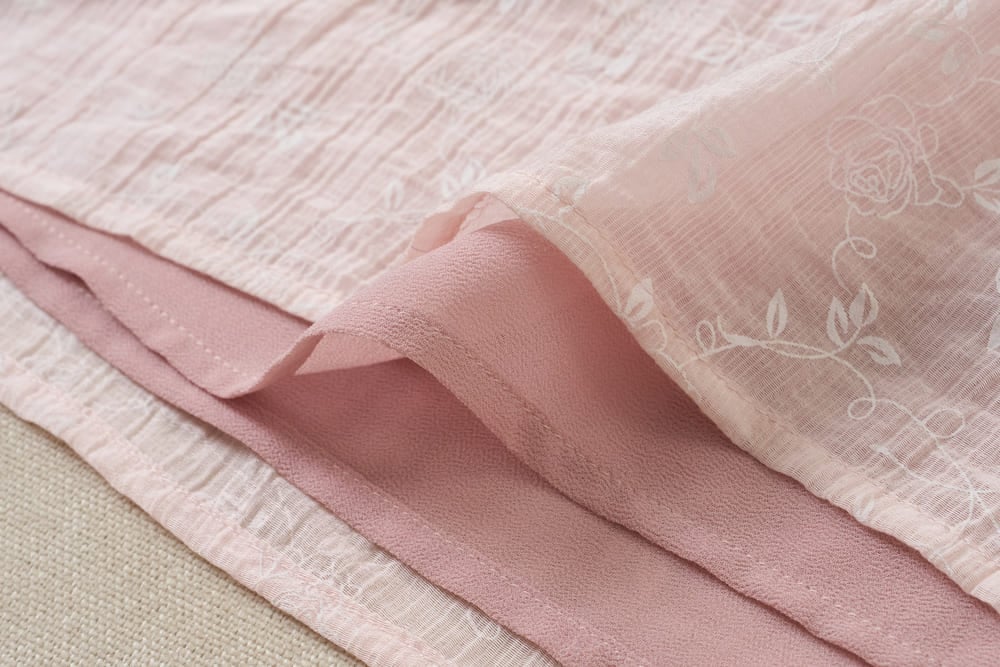 Áo thô nữ thêu tay cộc Raglan cổ tròn phối viền