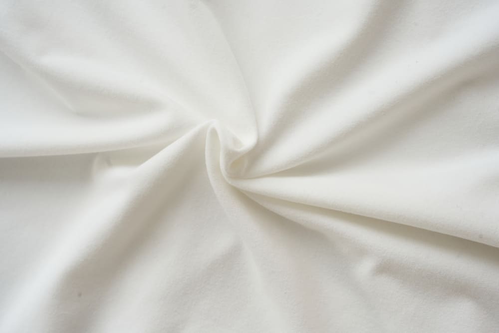 Áo nữ nỉ bông cotton dáng vai chờm cổ cao đính tag