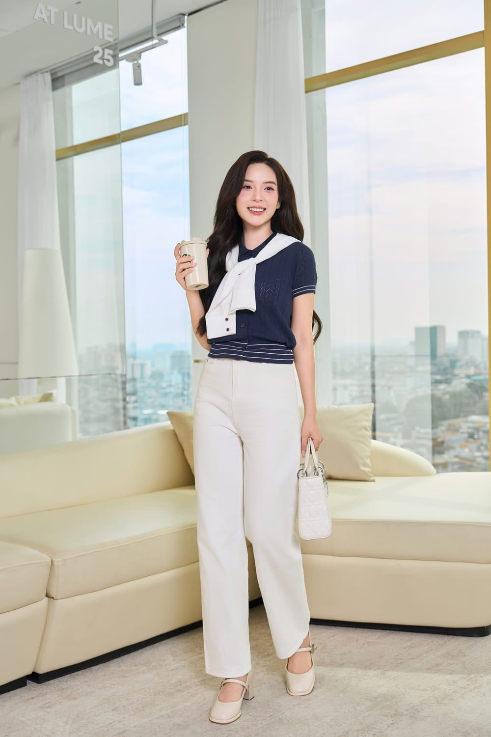 Áo polo nữ mặc cùng quần jean skinny