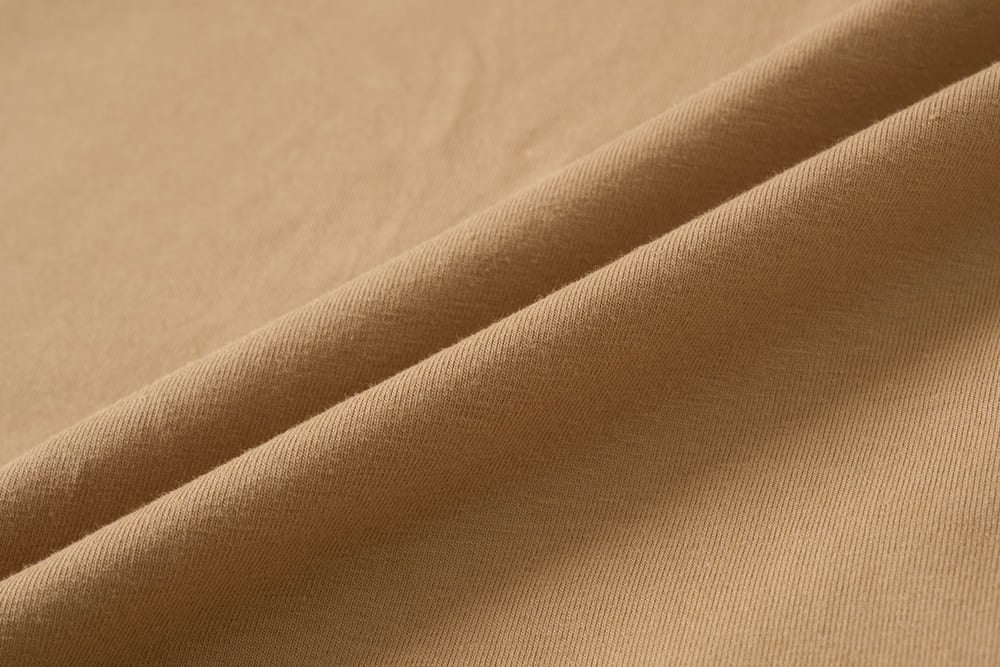 Áo thun cotton cổ tròn phối viền tay cộc túi ngực