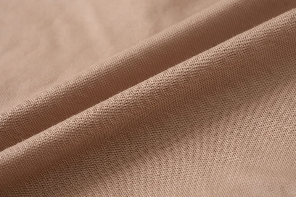Áo polo tay cộc có phối lơ vê cá tay