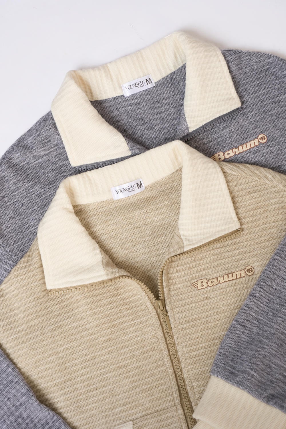 Áo khoác len sọc dáng ngắn kéo khóa phối túi trẻ trung