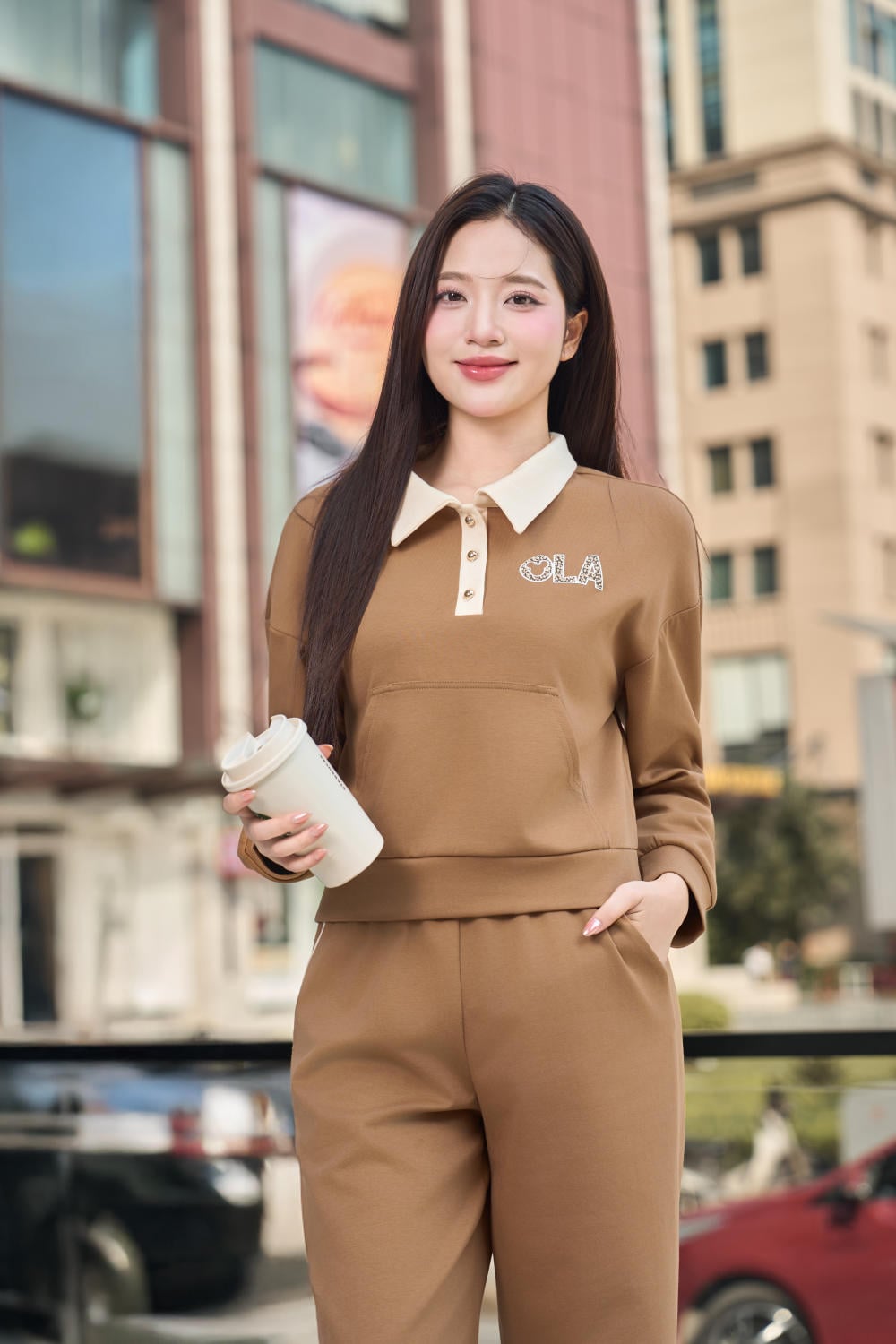 Áo thu đông nữ chất Umi dáng cổ đức phối túi hoodie năng động