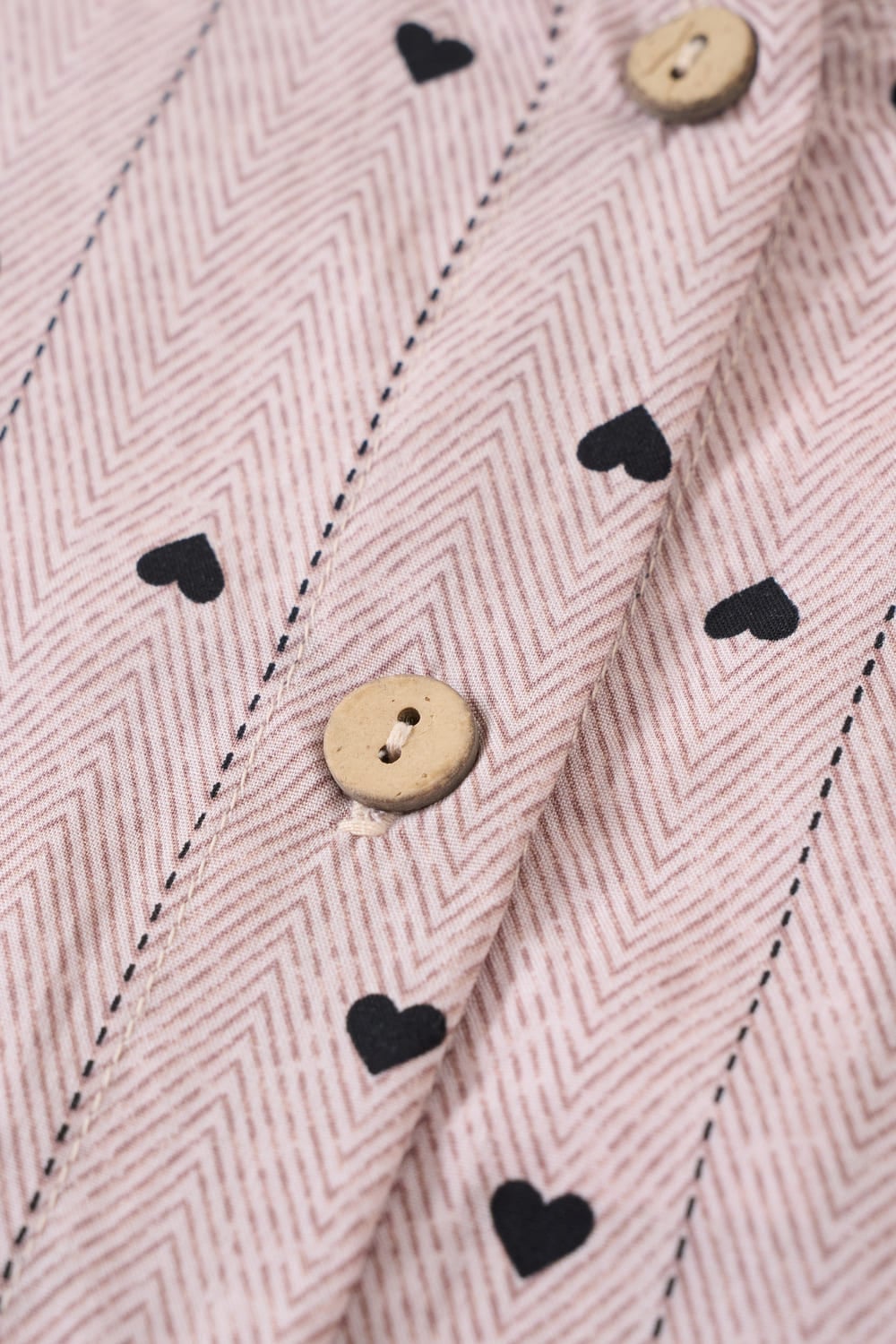 Bộ đồ lanh đùi sát nách cổ tròn gấu cuốn bèo họa tiết tim