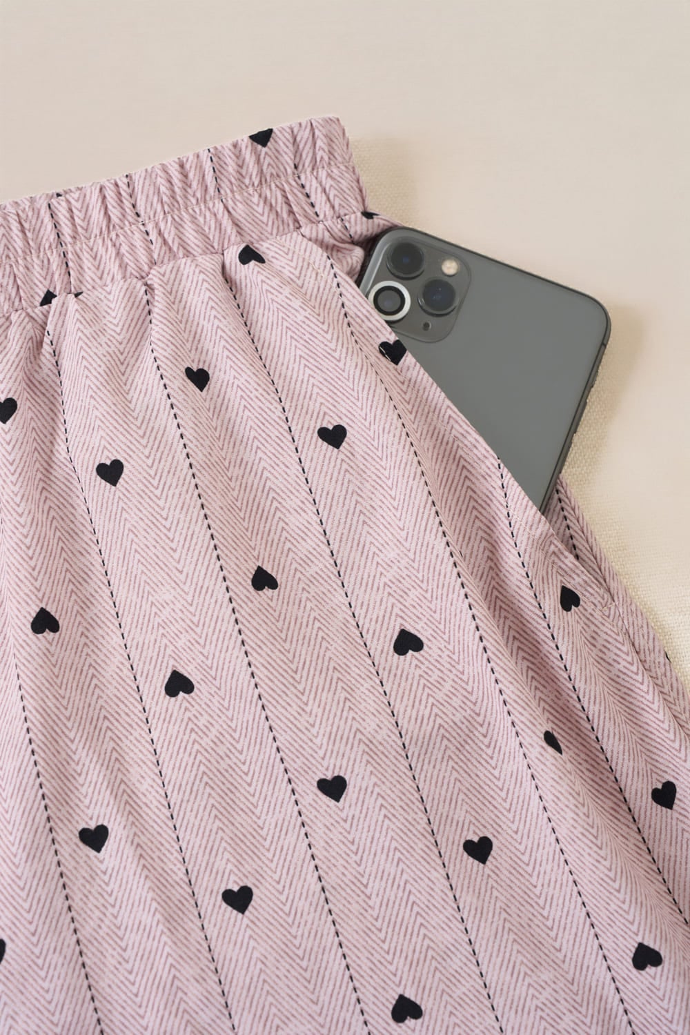 Bộ đồ lanh đùi sát nách cổ tròn gấu cuốn bèo họa tiết tim