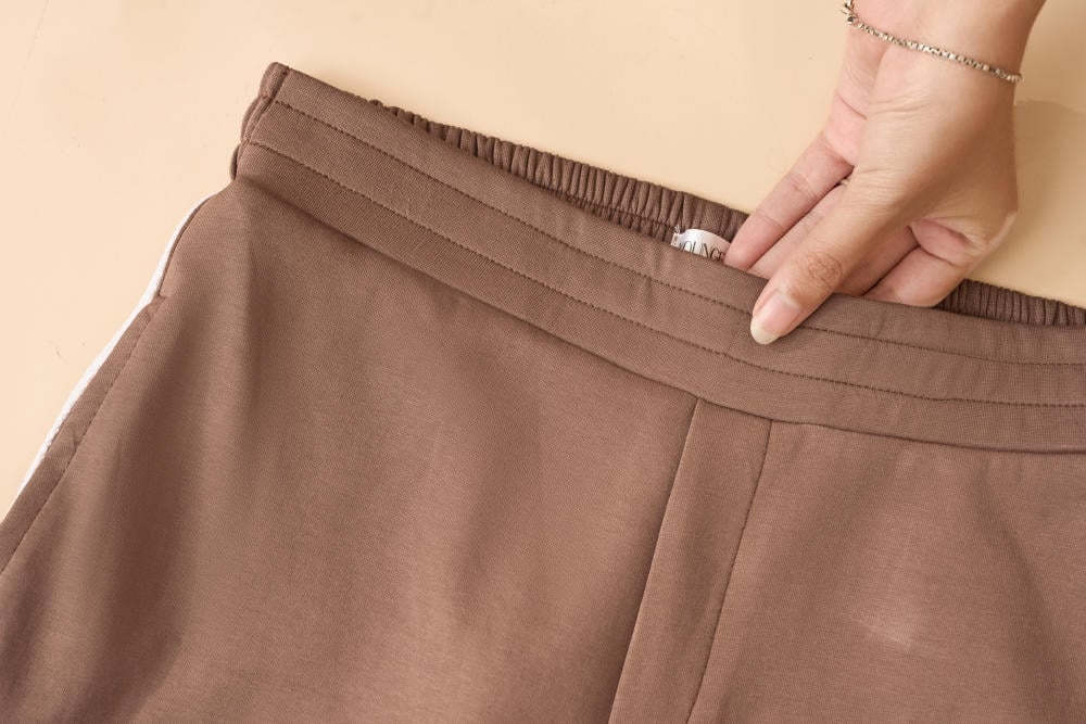 Quần dài thể thao nữ vải Umi dáng suông gấu dây rút