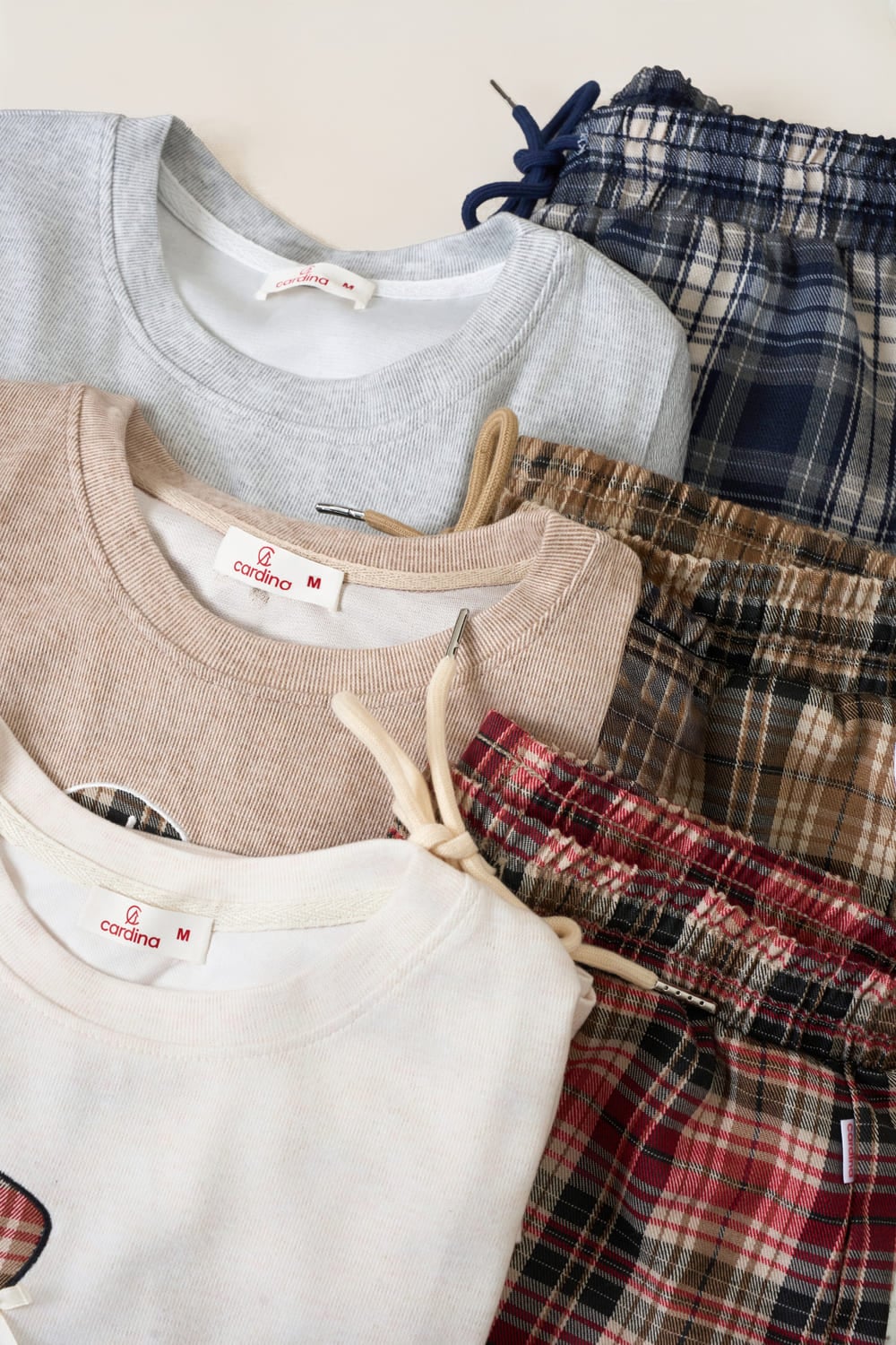 Bộ nỉ lông cừu dài tay cổ tròn vai chờm phối quần suông dạ kẻ