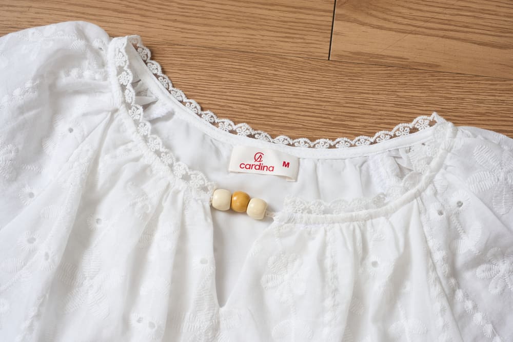 Áo thô nữ thêu tay cộc Raglan cổ tròn phối viền