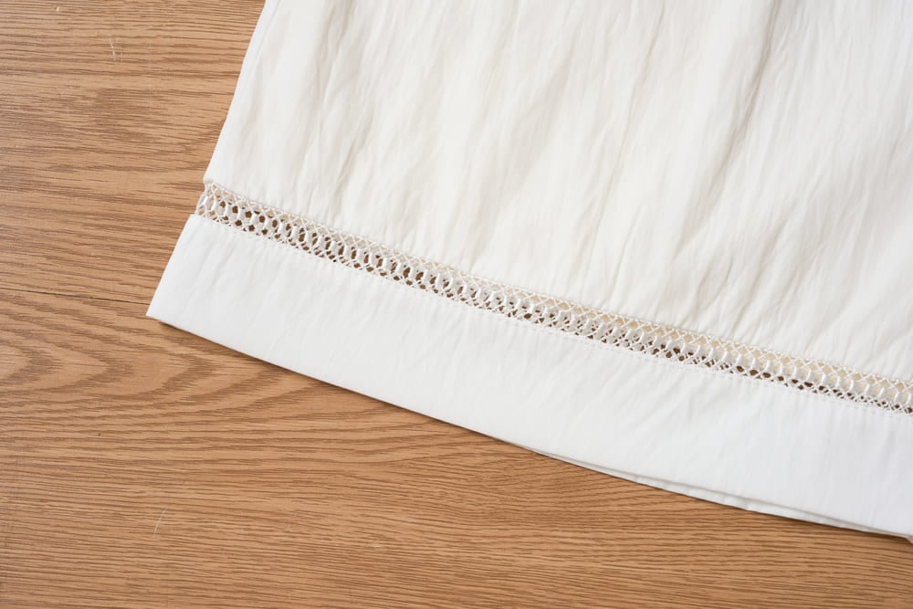 Quần sooc nữ thô gió dáng A cạp chun phối gấu