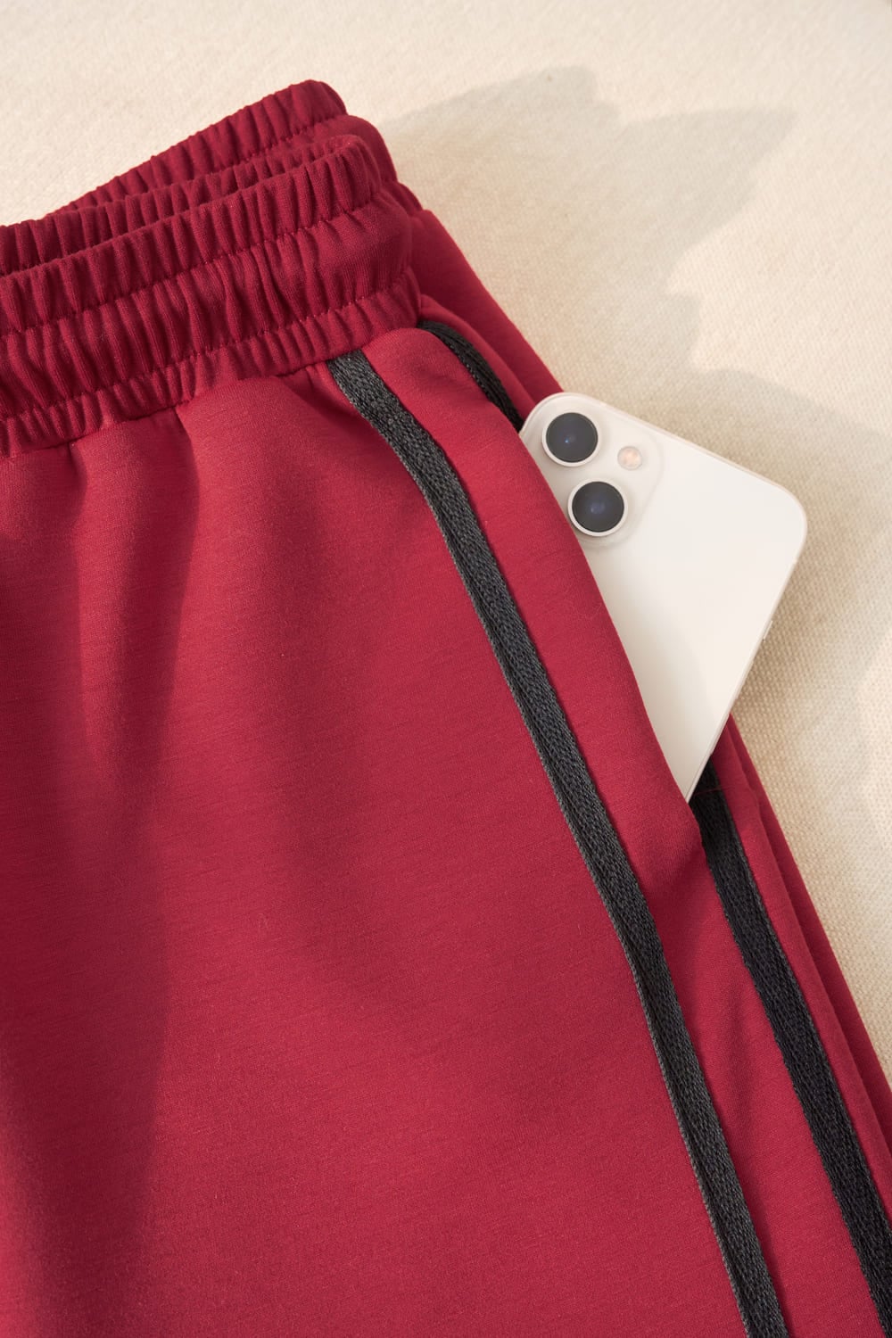 Quần nữ Younger dòng Streetwear vải umi mềm dáng bo gấu cạp chun phối sọc