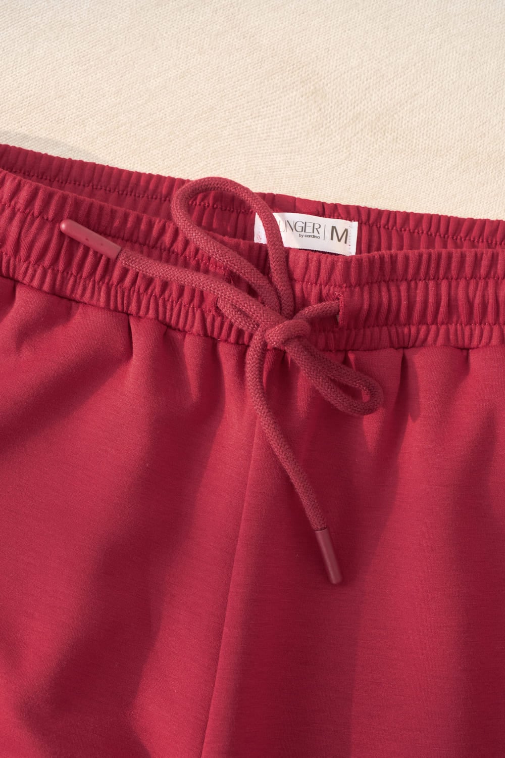 Quần nữ Younger dòng Streetwear vải umi mềm dáng bo gấu cạp chun phối sọc