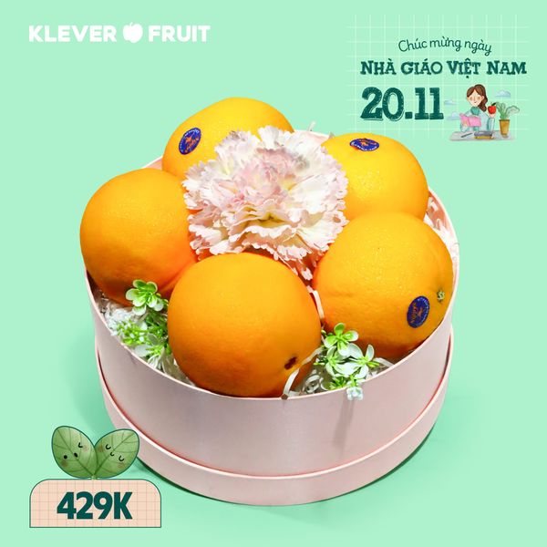 Hộp quà cam vàng mix hoa lụa tặng thầy cô 20/11 tại Klever Fruit
