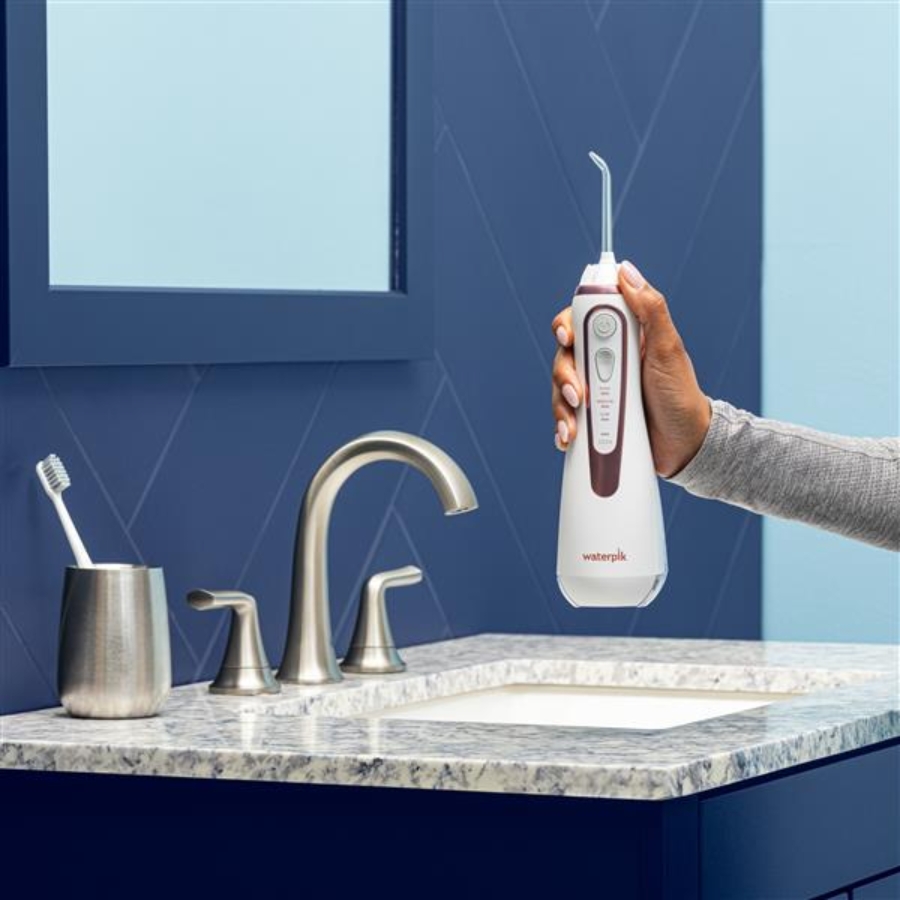 Máy tăm nước Waterpik&nbsp;WP589 / WP-589&nbsp;màu hồng trắng nhẹ nhàng, phù hợp cho cả nam và nữ sử dụng